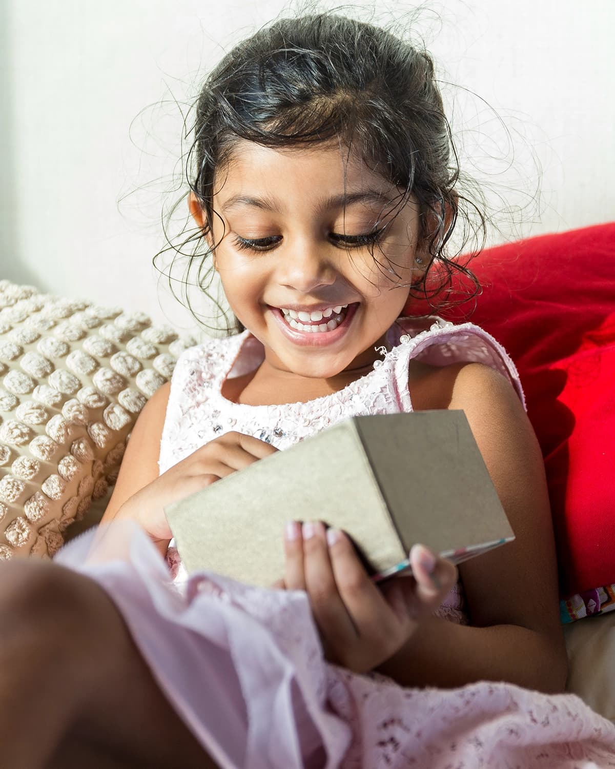 Two women sitting on a couch during therapy session